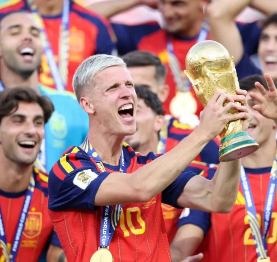 Spain’s Dani Olmo lifts the FIFA World Cup Winner’s Trophy.
