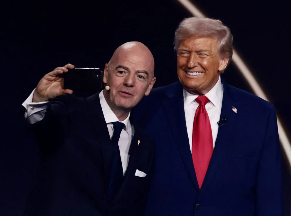 FIFA President Gianni Infantino and U.S. President Donald Trump pose for a selfie during the FIFA World Cup 2026 Draw.