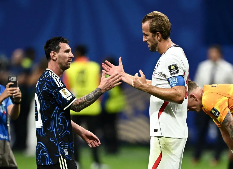 Argentina's Lionel Messi shakes hands with England's Harry Kane at the end of the match at the Atlanta Stadium.