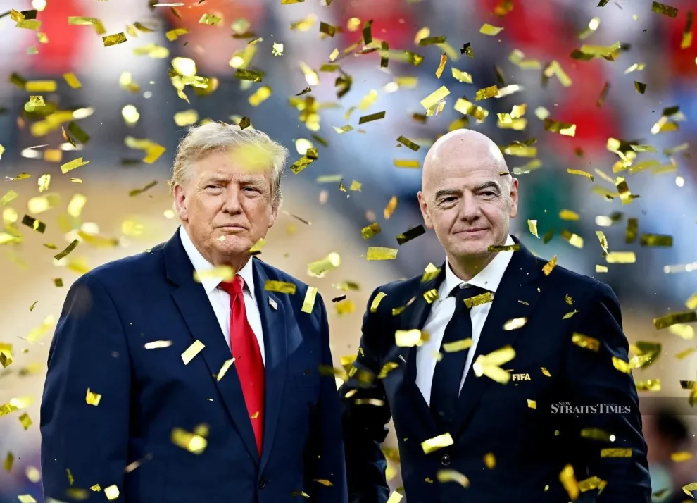 US President Donald Trump and FIFA President Gianni Infantino during the trophy presentation after the match