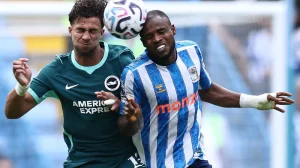 Brighton's Greek striker #19 Charalampos Kostoulas (L) and Coventry City's Nigerian midfielder #16 Frank Onyeka (R) jump up to head the ball during the English Premier League football match between Coventry City and Brighton and Hove Albion at the Coventry Building Society Arena in Coventry, central England on Sept 13