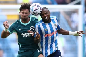Brighton's Greek striker #19 Charalampos Kostoulas (L) and Coventry City's Nigerian midfielder #16 Frank Onyeka (R) jump up to head the ball during the English Premier League football match between Coventry City and Brighton and Hove Albion at the Coventry Building Society Arena in Coventry, central England on Sept 13